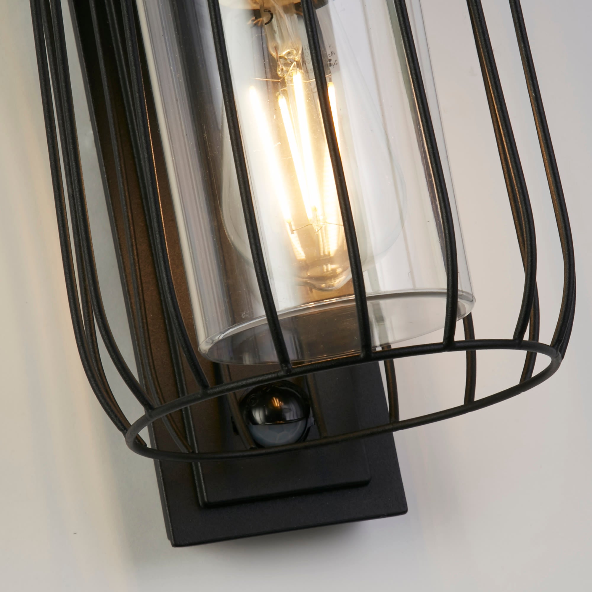 Reed 1Lt Wall Light with PIR , Black Metal and PC Shade