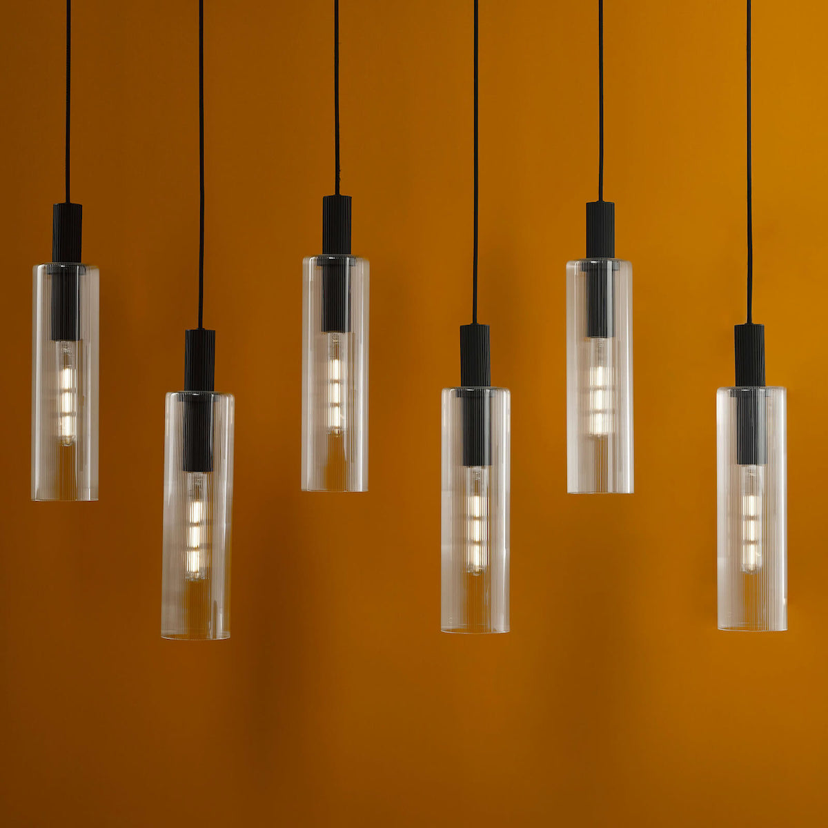 RUBEN 6LT BAR PENDANT BLACK CLEAR RIBBED GLS