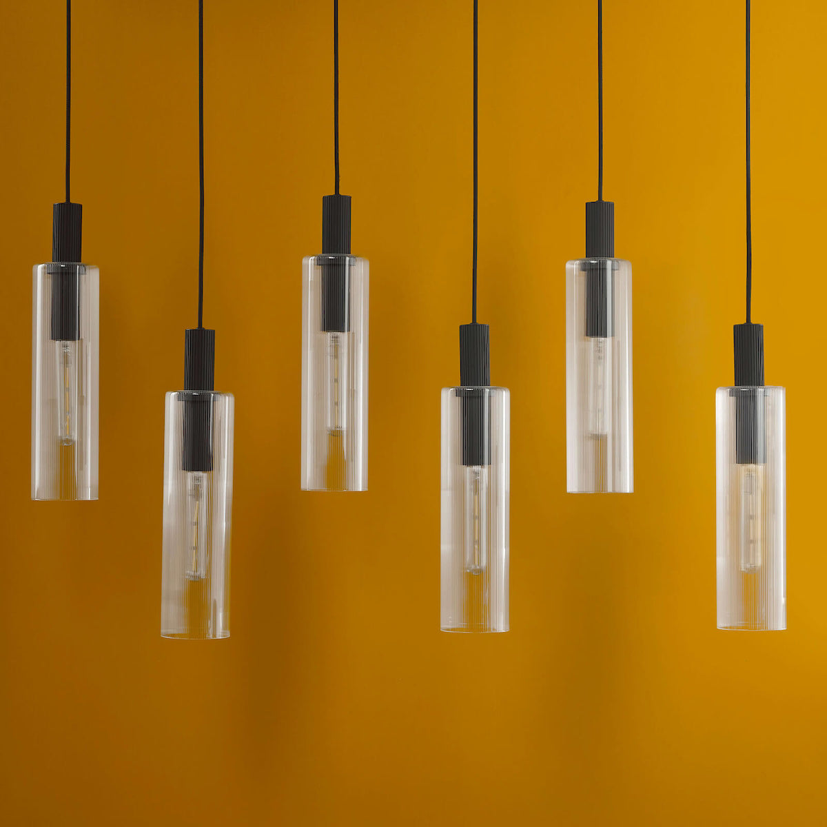 RUBEN 6LT BAR PENDANT BLACK CLEAR RIBBED GLS